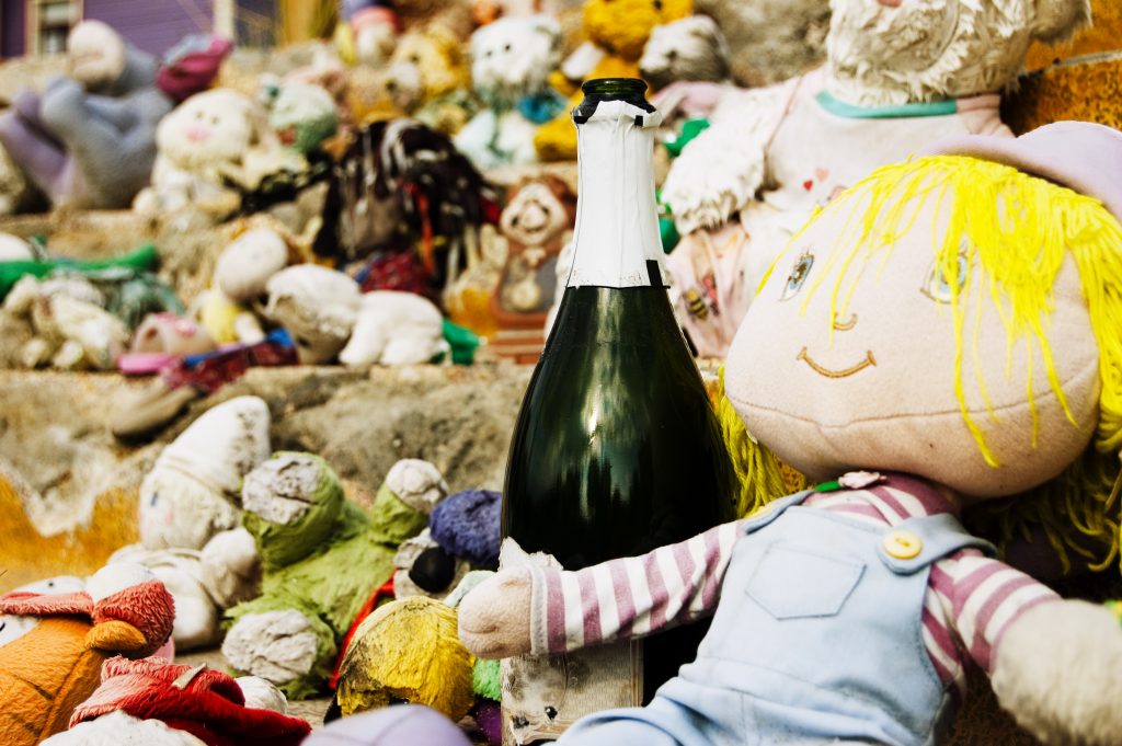 Toys After Katrina New Orleans October 2006 In Lower Garden District Photographer George Hancock booze dolls