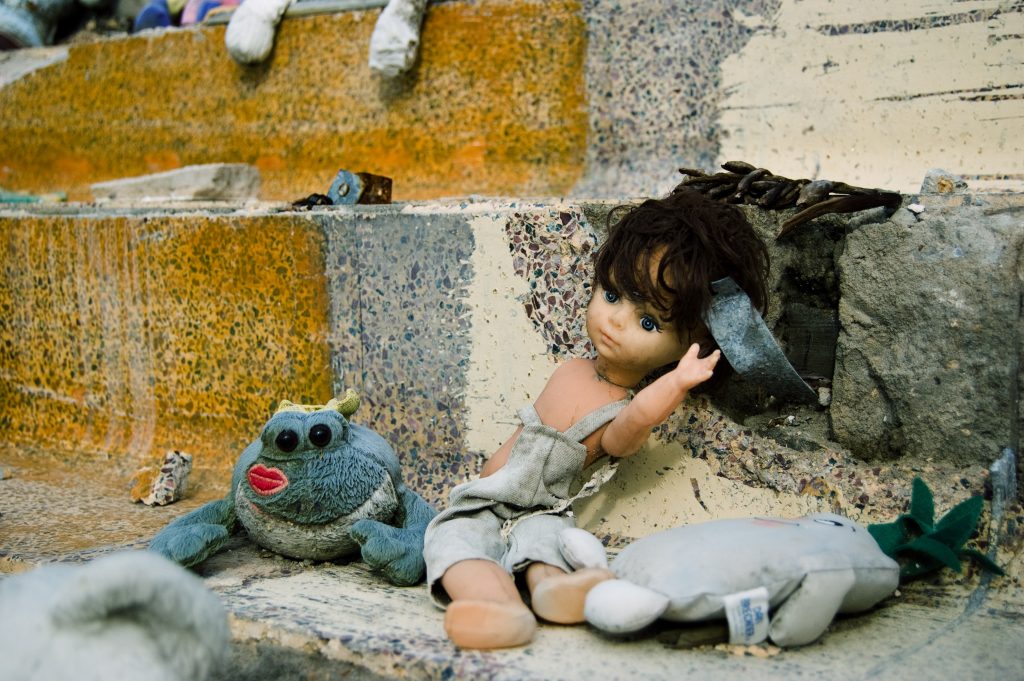 Toys After Katrina New Orleans October 2006 In Lower Garden District Photographer George Hancock Frog Kiss Armless Doll