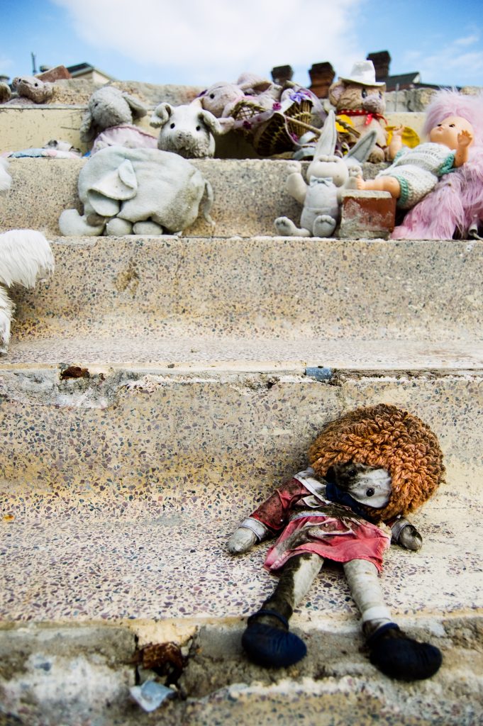Toys After Katrina New Orleans October 2006 In Lower Garden District Photographer George Hancock Red Doll Raggiety Anne