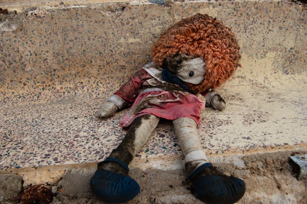 Toys After Katrina New Orleans October 2006 In Lower Garden District Photographer George Hancock Red Doll Raggiety Anne