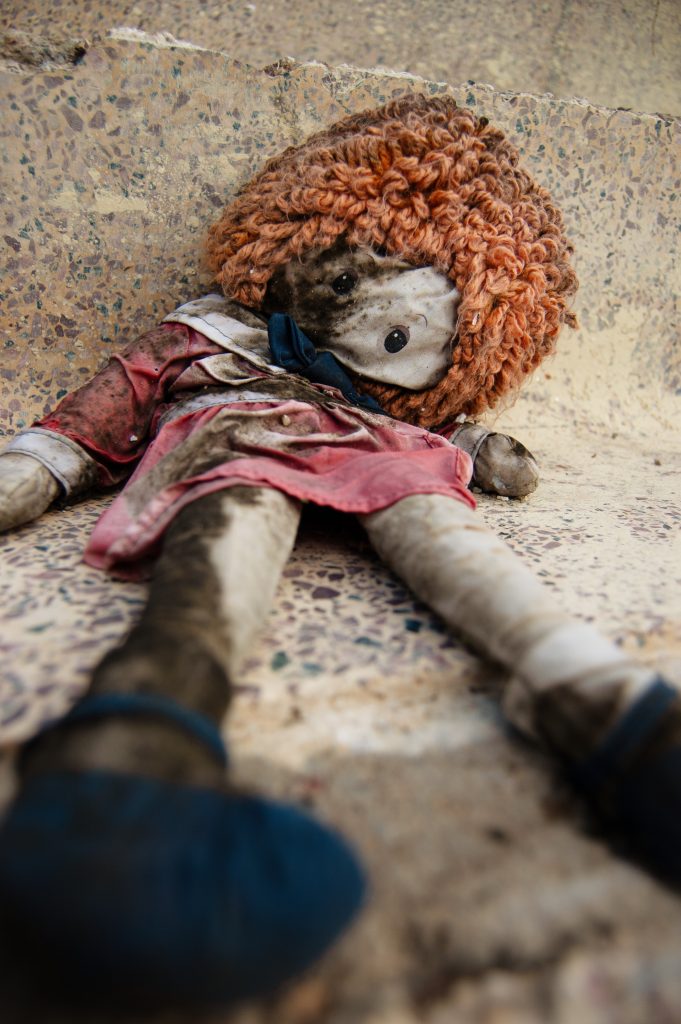 Toys After Katrina New Orleans October 2006 In Lower Garden District Photographer George Hancock Red Doll Raggiety Anne