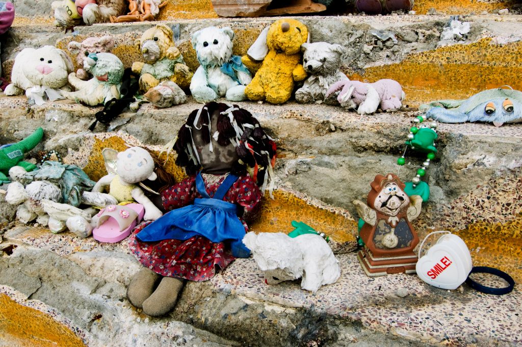 Toys After Katrina New Orleans October 2006 In Lower Garden District Photographer George Hancock Clock Beauty and Beast Smile