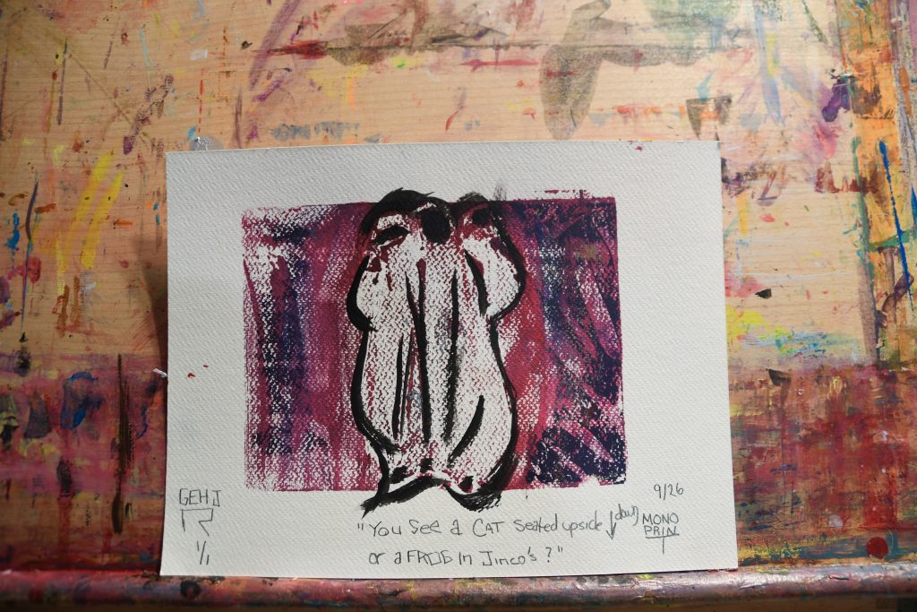 You see a cat seated updsidedown or a frog in jincos - gel plate print - artist George Hancock abstract Memphis Tennessee - red white black